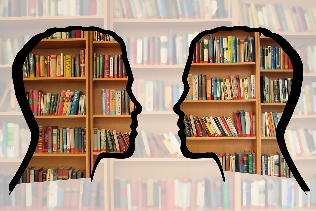 Image of two heads talking